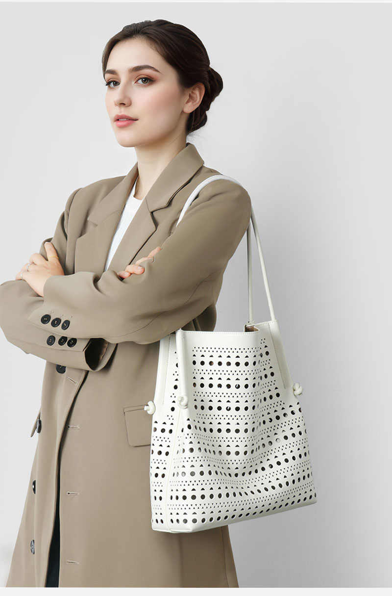 Chic Women's Leather Shoulder Bag with Hollowed-out Design